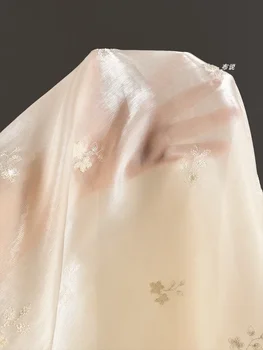 Jacquard hímzés szövet Vízfényes fonal Sima perspektivikus fonal Design ruházat Varró nagykereskedelmi szövet poliészter anyag